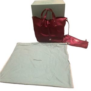 Tiffany & Co. Reversible Purple Suede/Leather size 10” by 8” approximately.